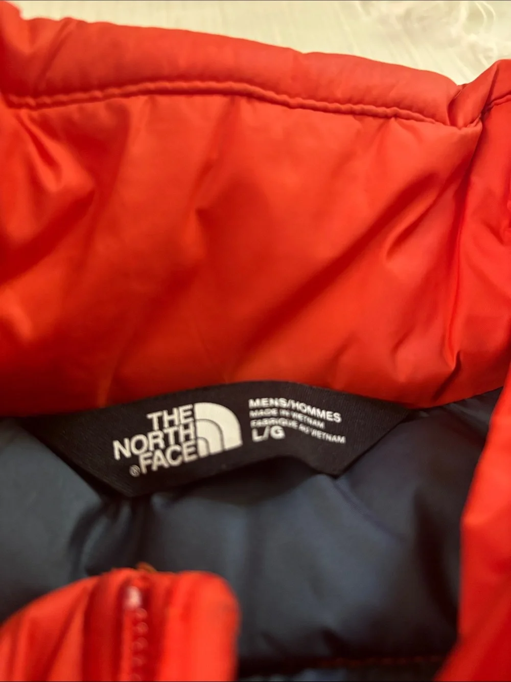 The North Face Orange Quilted Puffer Vest